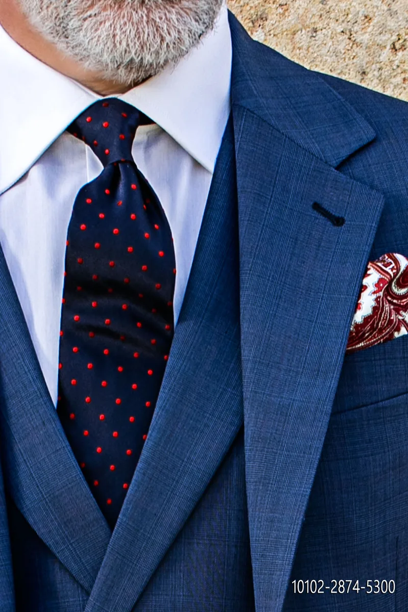 Cravatta in pura seta blu con pois rossi
