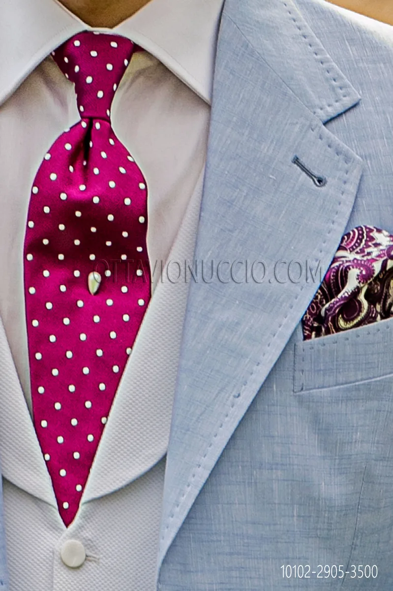 Corbata en pura seda fucsia con lunares blancos