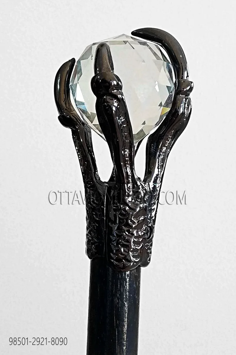 Black cane with gunmetal grey claw and crystal sphere