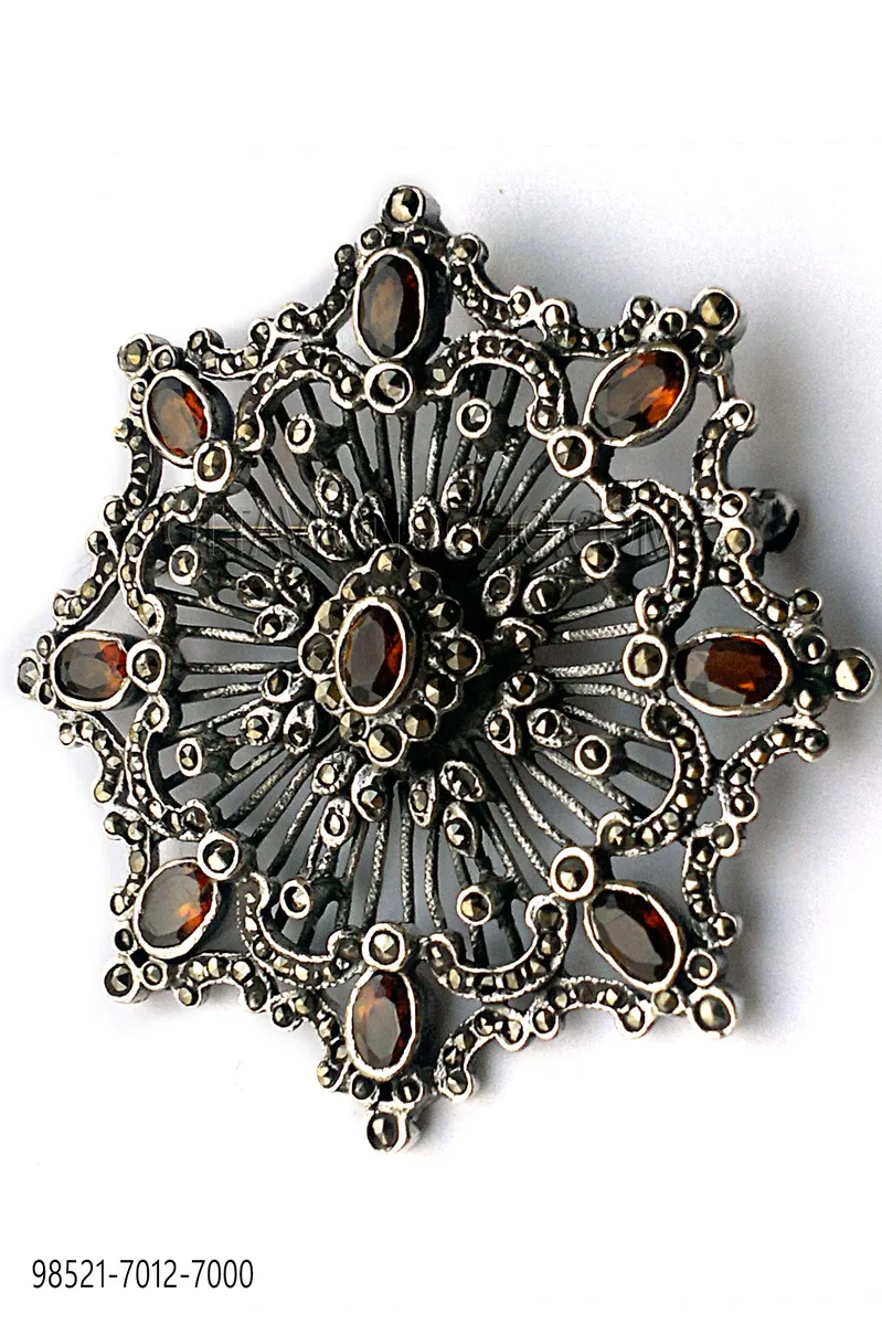 Spilla stella placcata in argento