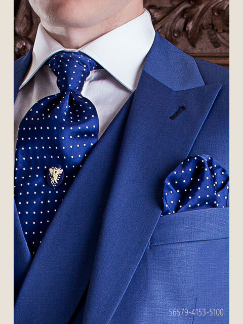 Cravattone da annodare e fazzoletto blu con pois bianchi